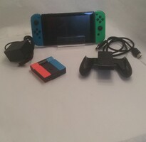 Green and Blue Nintendo Switch with HDMI, Dock, Joy-Con Grip, and Power Cord