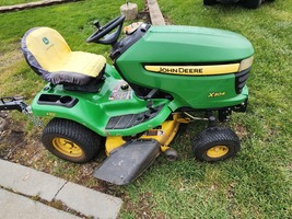 JOHN DEERE 304XRiding Lawn Mower - 42" Deck - 4 Wheel Steer
