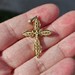 14K Yellow Gold Diamond Cut Filigree Curved Cross Pendant 1.25x.75 inches