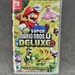 Nintendo Switch Super Mario Bros U Deluxe Video Game with Case