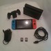 Nintendo Switch Bundle, Includes Cords, Charging Dock, JoyCon Grip, and 2 Games