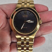 Citizen Eco-Drive WR100 Gold Toned Wristwatch Reflective Face E101-S044286