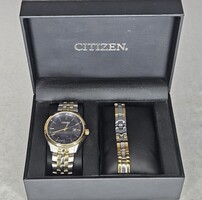 Citizen Eco-Drive E111-R007131 Gold and Silver Toned Wristwatch with Bracelet